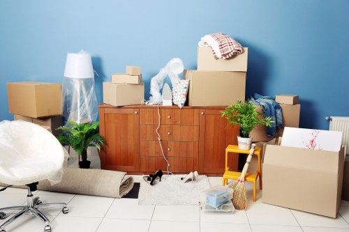 Furniture pick-up service for a Kingston home with bulky items ready for removal