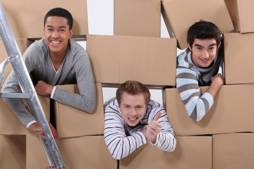 Boxes and furniture ready for urgent house removals in Kingston