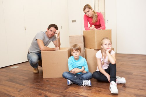 Loading household furniture into a removal van in Kingston