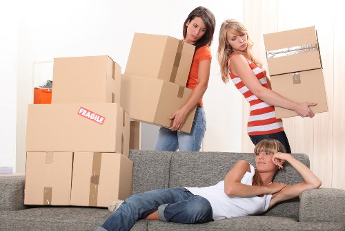 Careful loading of office furniture and equipment during a Kingston business move