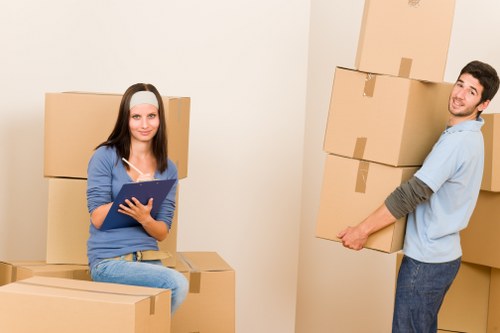 Business furniture and equipment being prepared for a Kingston move